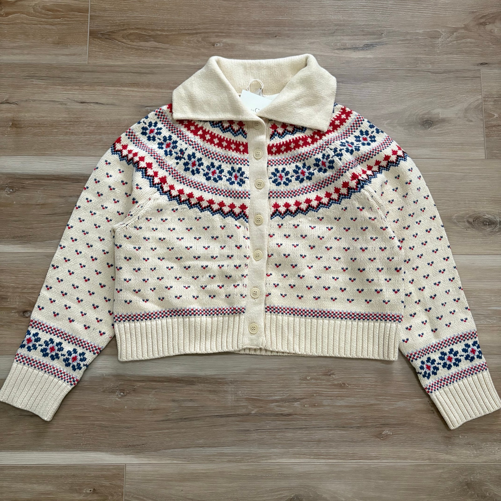 The Great. Cream Fair Isle Cropped Button Cardigan With Red & Blue Accents